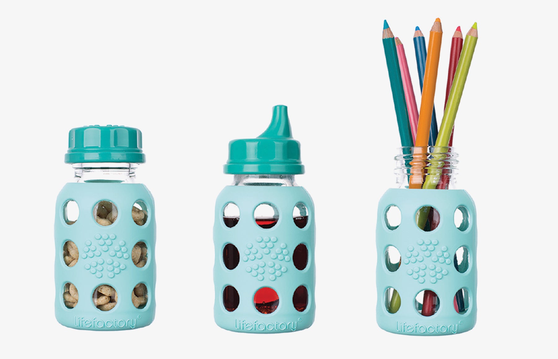 Multiple uses for glass baby bottles including to hold snack with flat cap, for drink with sippy lid, and a holder for colored pencils without lid.